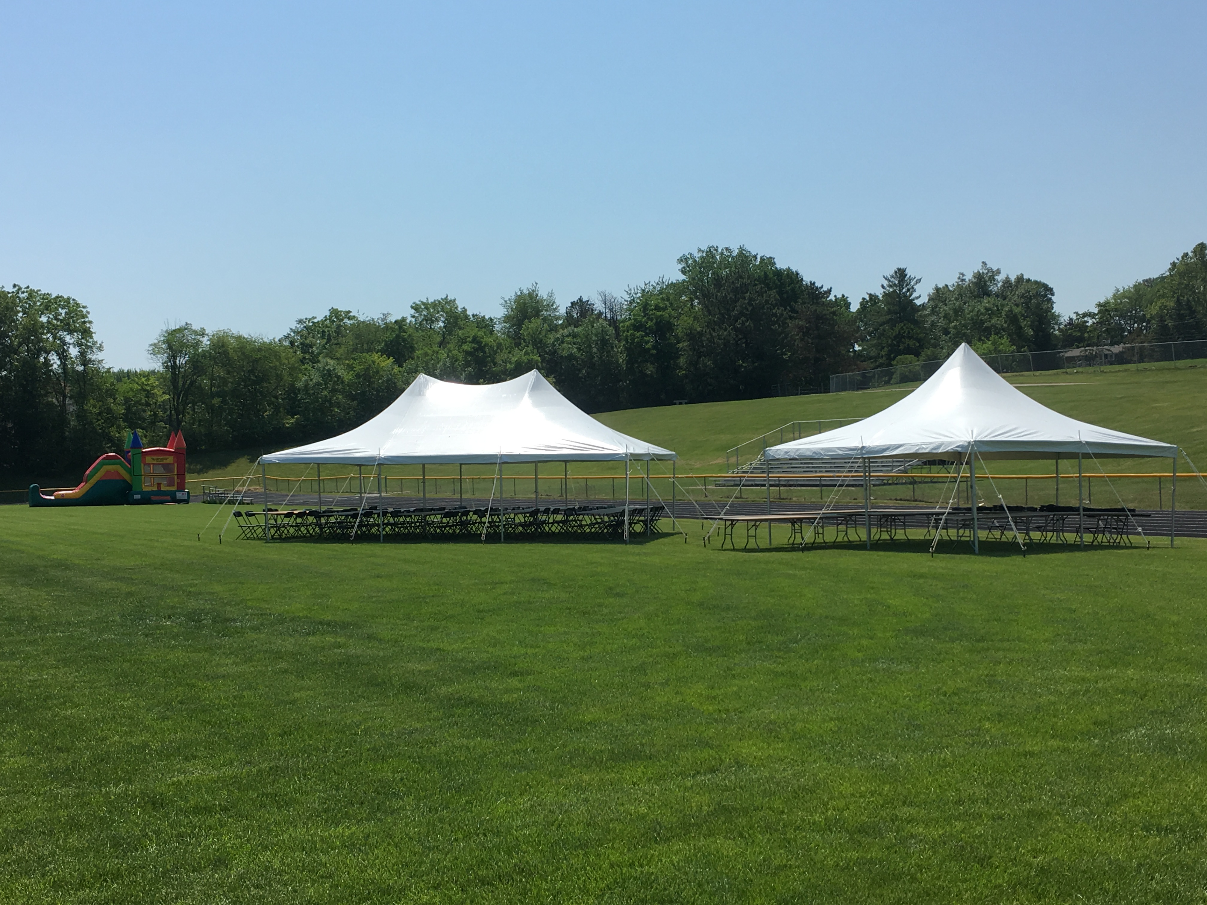 Bounce house (left), 20'x30' rope and pole tent (middle) and 20'x20' rope and pole tent (right) closeup