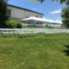 Chairs and 20' x 60' frame tent at outdoor wedding at HighPoint City Church