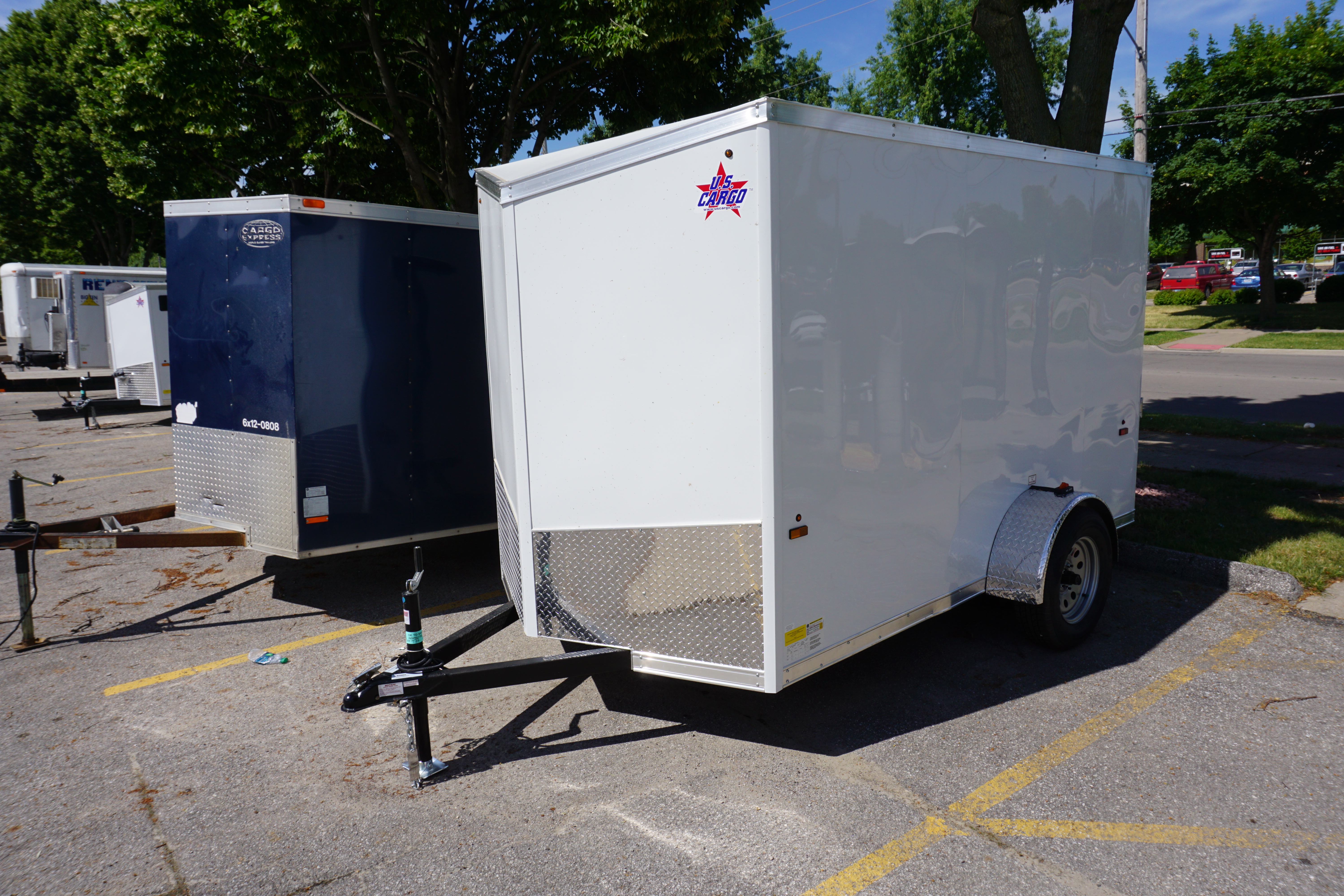 Left front of 6' x 10' white single axle enclosed trailer [sn2852]