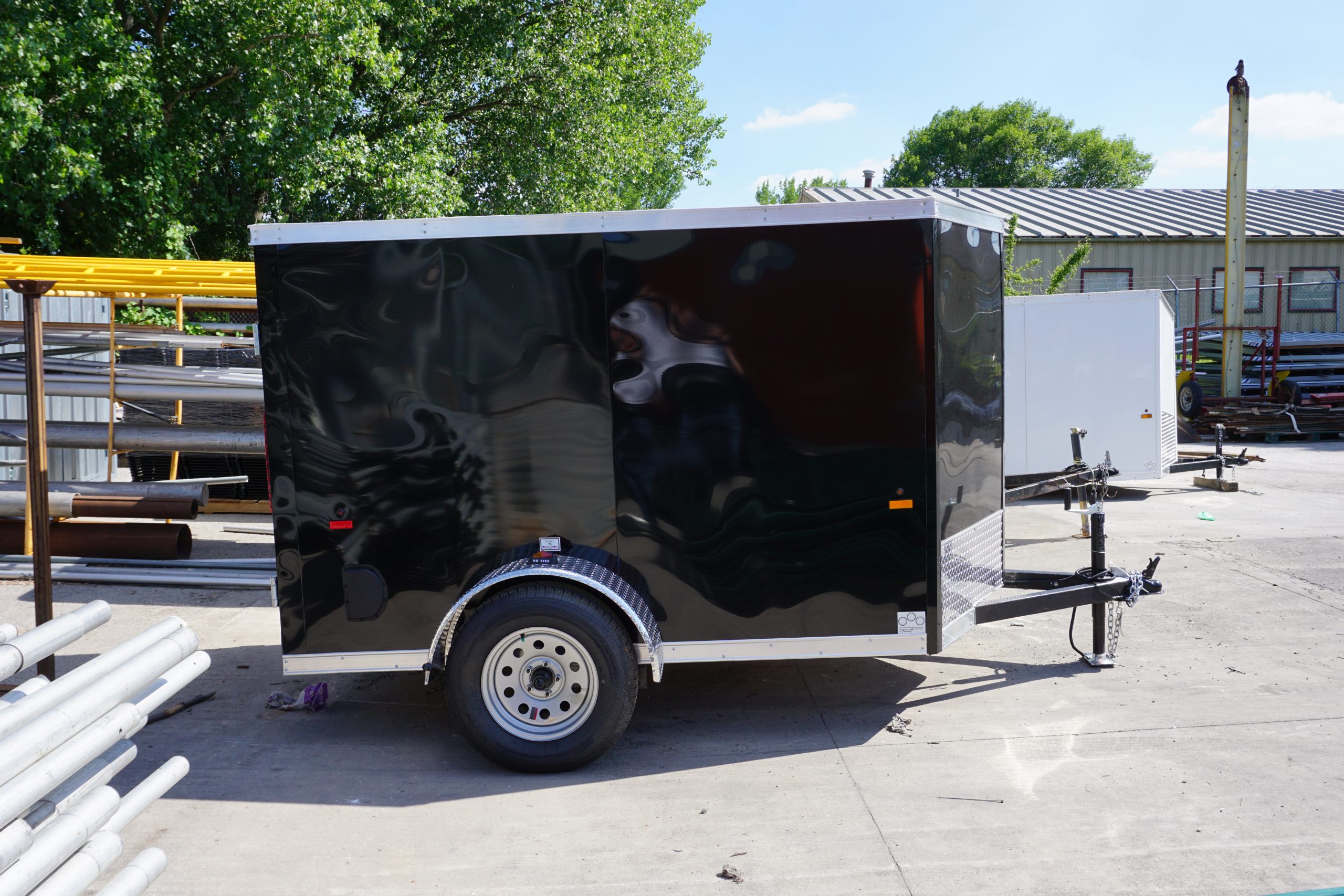 Right side of 5' x 8' black single axle enclosed trailer [3055]