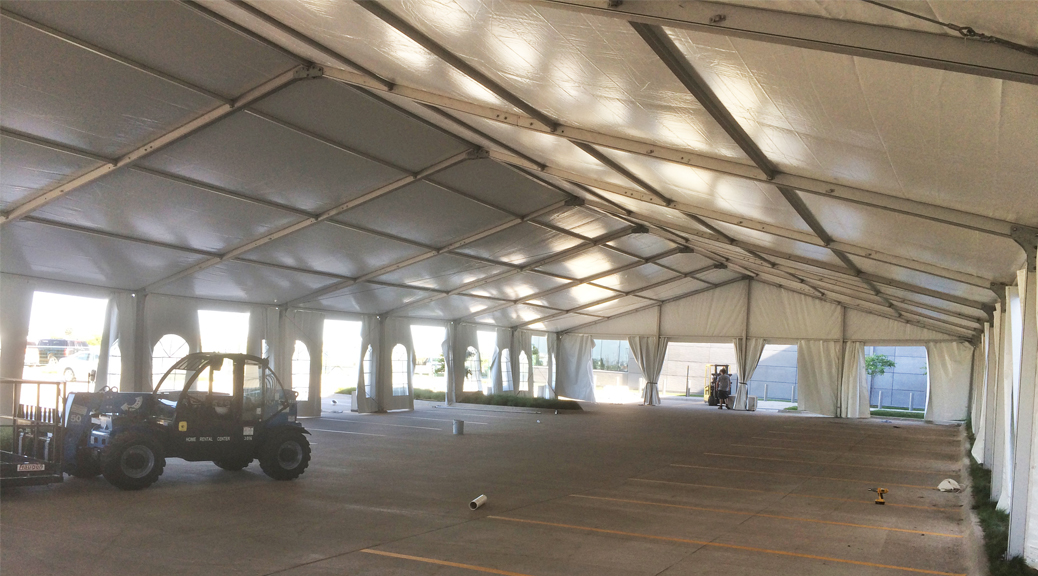Setup from inside the 60' x 131' Clearspan tent for the grand opening event