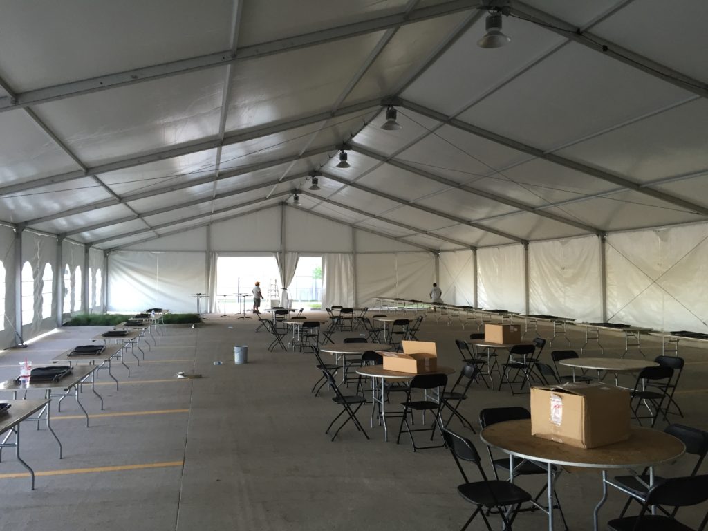 Under 60' x 131' clearspan Losberger tent at brownells in Grinnell, Iowa