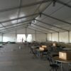 Under 60'x131' clearspan Losberger tent at brownells in Grinnell, Iowa