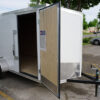 White 6'x12' enclosed cargo trailer Vin Number 2831 front door open