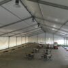 Inside the 60' x 131' Clearspan tent for the grand opening event of Brownells location in Grinnell, Iowa with lights