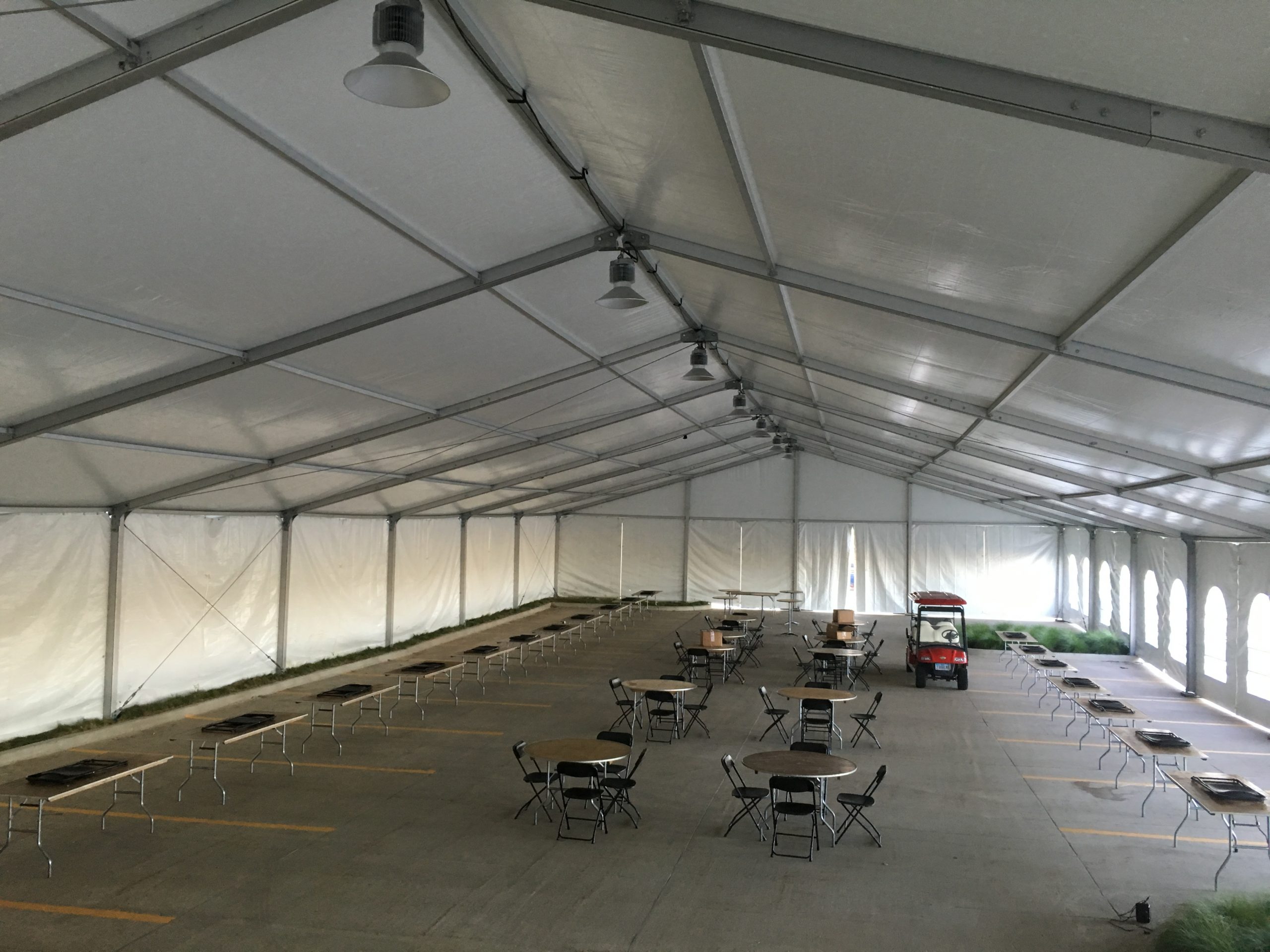 Inside the 60' x 131' Clearspan tent for the grand opening event of Brownells location in Grinnell, Iowa with lights