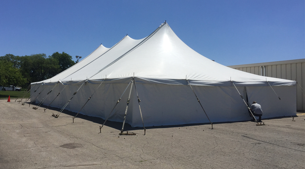 40' x 80' rope and pole tent for Store for homes furniture tent sale in Newton, Iowa (Header image)