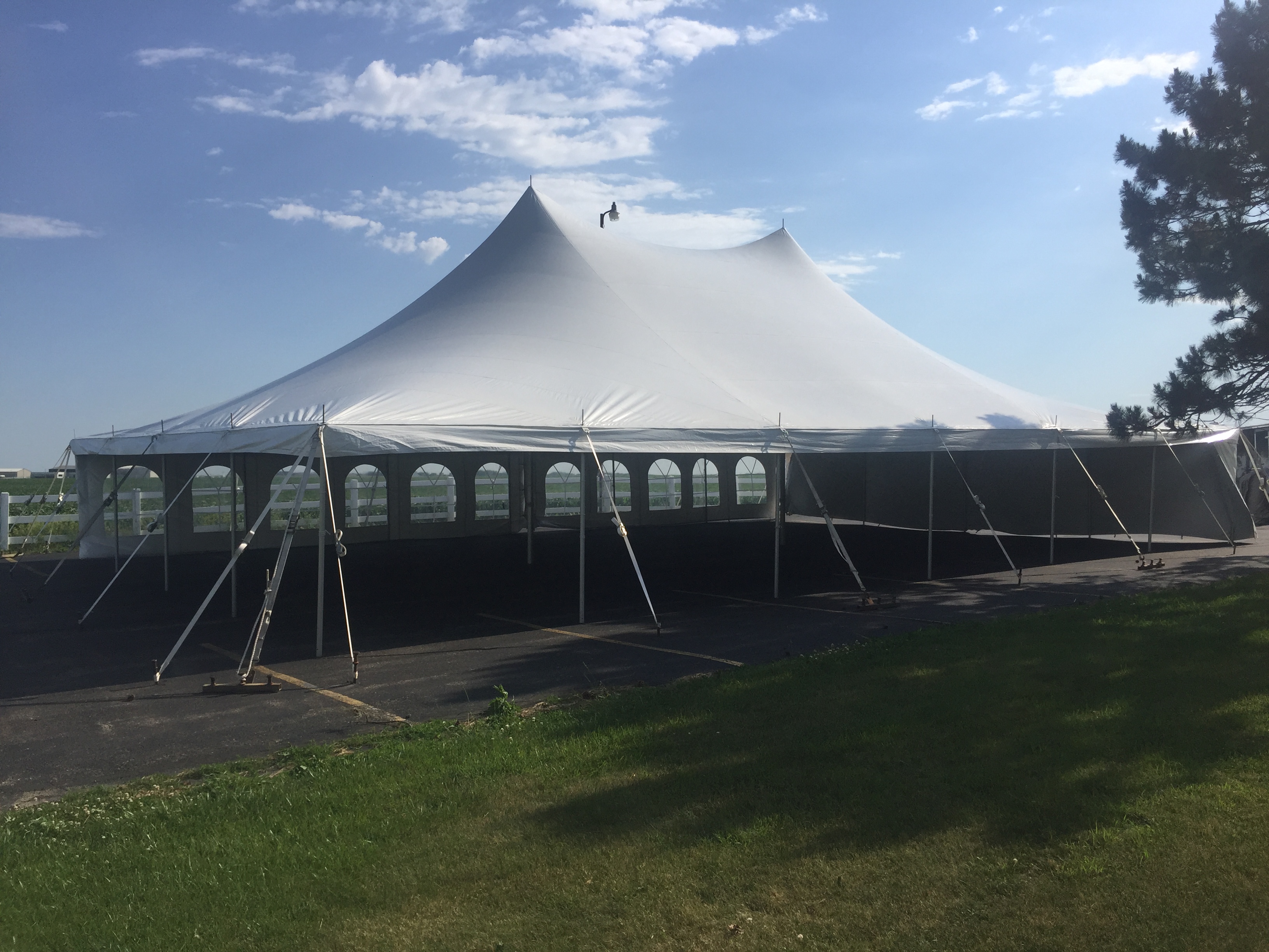 Open side of 40' x 60' rope and pole wedding tent at church in Grinnell, Iowa