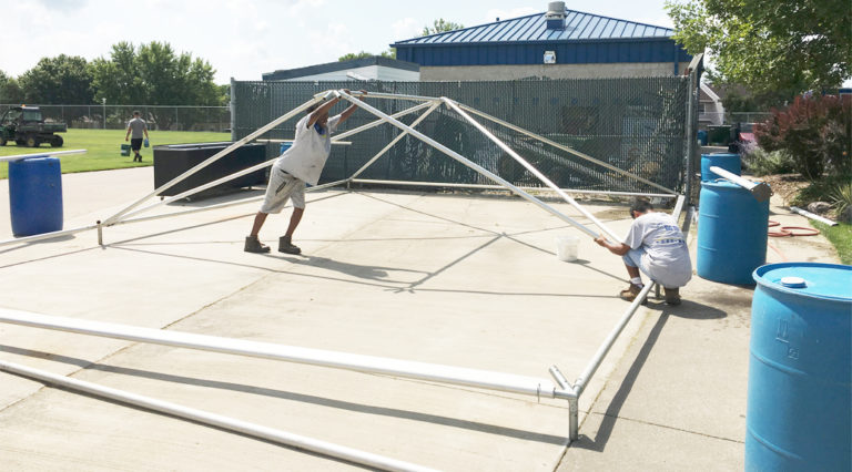Putting the frame portion of a frame tent together