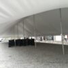 Under the 40' x 120' rope and pole tent at Knoxville Raceway (Marion County Fairgrounds) in Iowa
