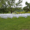 White wedding chairs outside at Wapsipinicon State Park