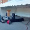 20' x 40' frame tent with stage between Rienow Hall and Quadrangle Hall in Iowa City