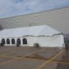 30' x 75' frame tent with temporary sidewall and 2' x 2' x 2' bunker blocks at Brownells in Grinnell, Iowa