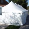 End of 20' x 60' rope and pole tent with sidewall at Millstream Brewing Company in Amana, IA with crew guys