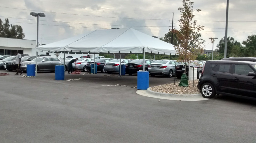 Finished 20' x 30' frame tent for the grand re-opening at Coralville Used Car Superstore