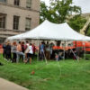 Students under our 20' x 30' rope and pole tent set up for SCOPE Productions: University of Iowa
