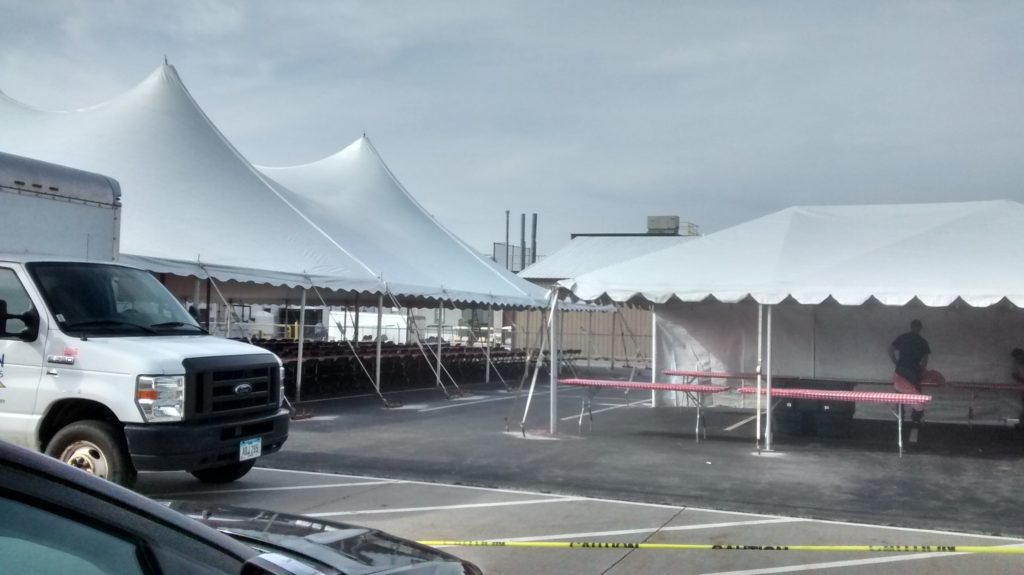 60' x 90' rope and pole tent and 20' x 30' frame tent for Morris & Company Entertainment in Davenport, Iowa