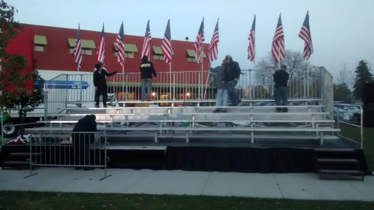 Our bleachers on the level stage we setup for Hillary Clinton political rally at NewBo City Market in Cedar Rapids, Iowa