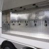 Closeup view of the six taps on the refrigerated draft beer trailer for rent