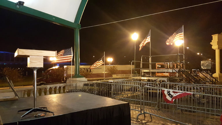 We setup the podium, stage, barricade and in the background press risers with stairs for this political event at Larsen Park, Sioux City, Iowa