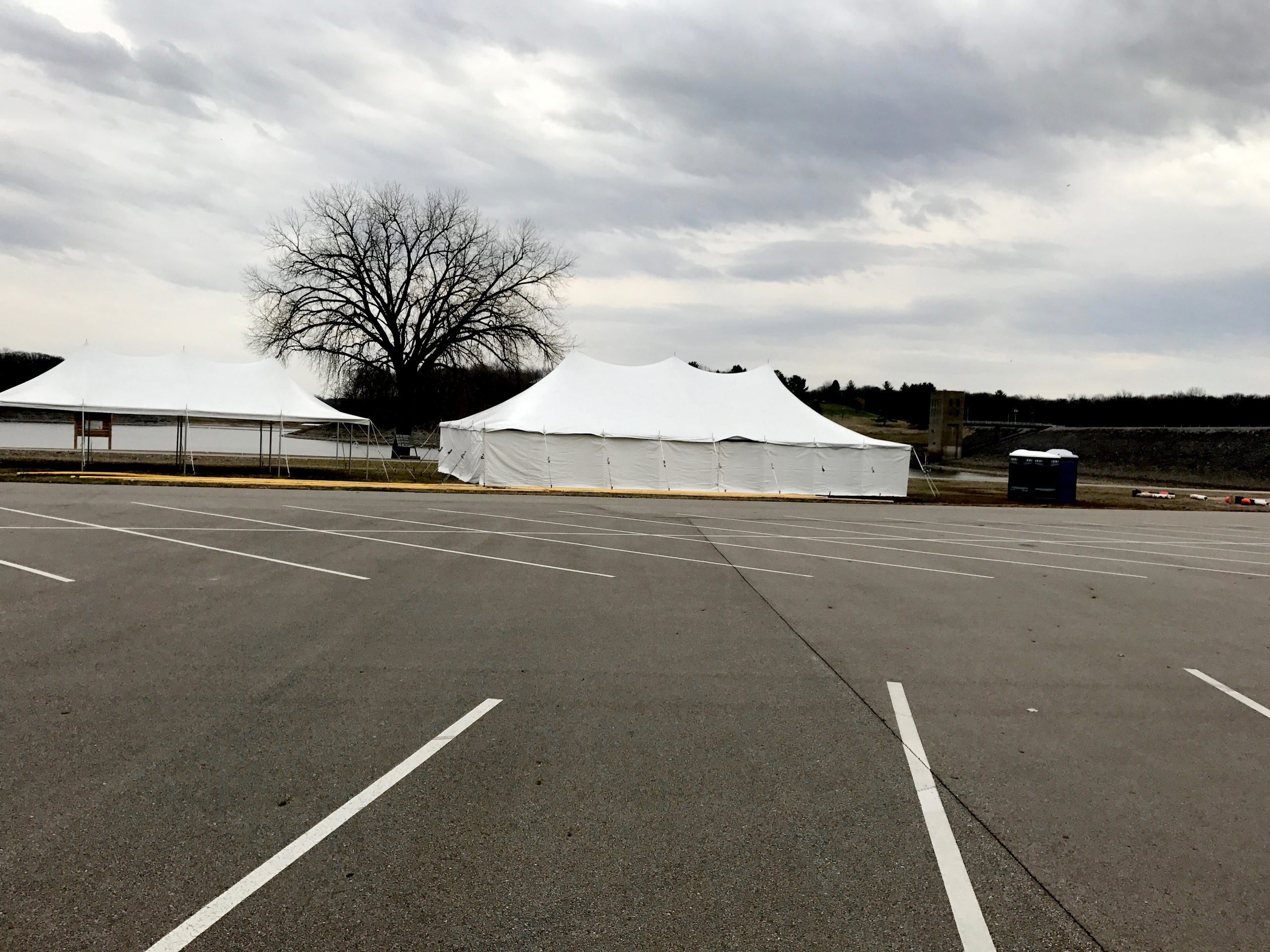20' x 40' rope and pole tent (left with no side walls), 30' x 60' rope and pole tent (right) for Special Olympics Polar Plunge 2017