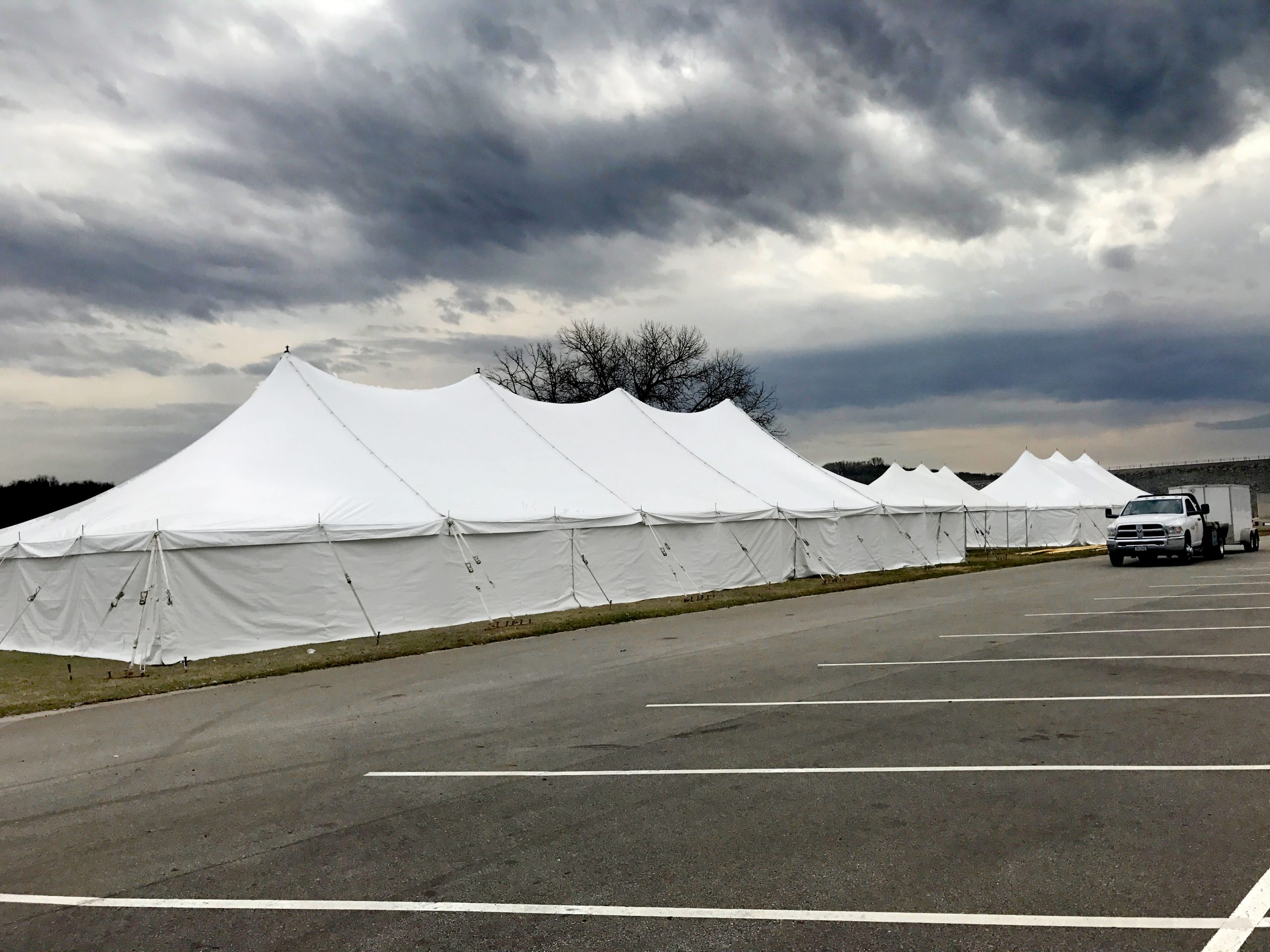 40' x 100' Elite rope and pole tent (left), 20' x 40' rope and pole tent (middle), 30' x 60' rope and pole tent (right) for Special Olympics Polar Plunge 2017