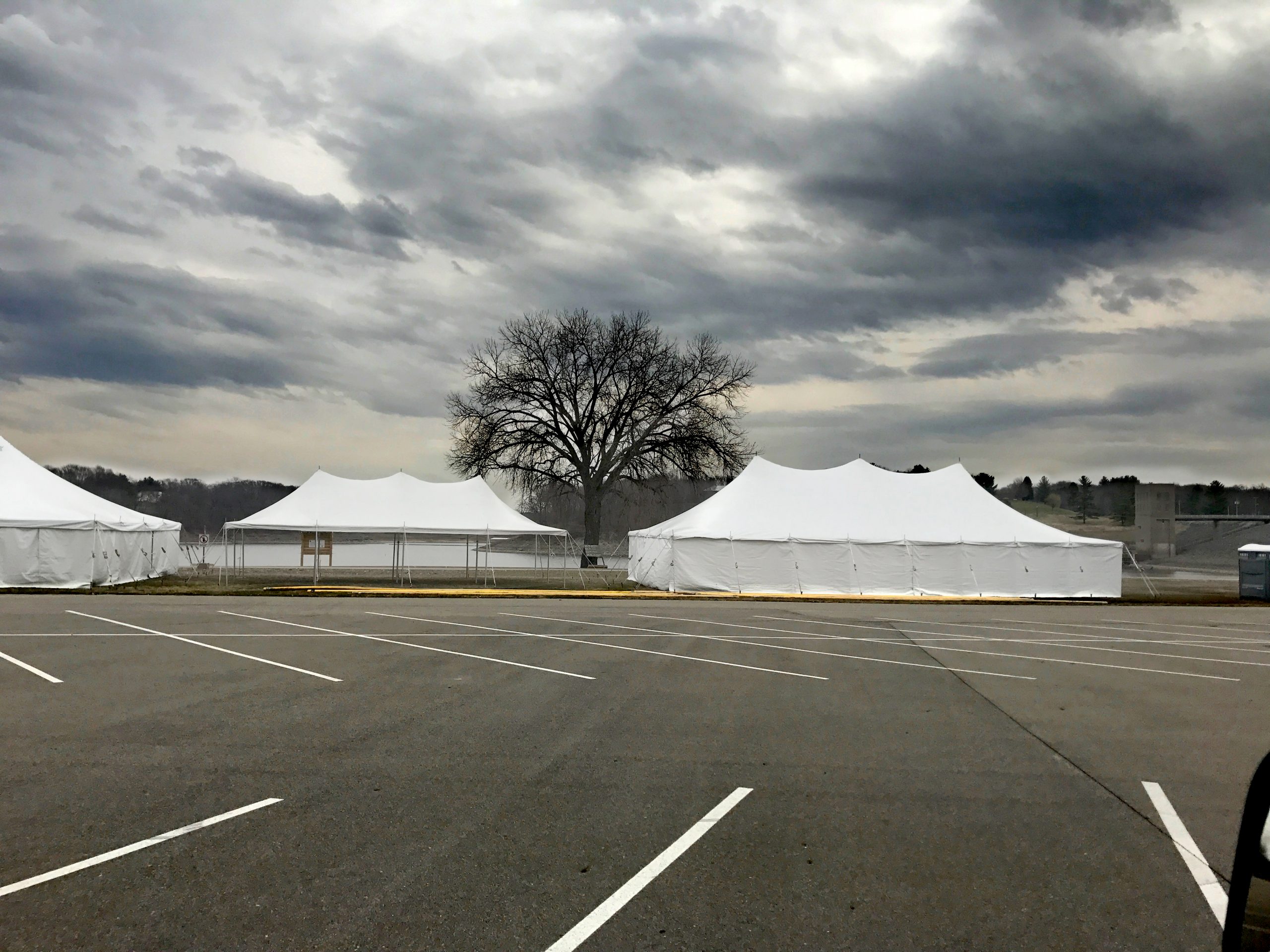 40' x 100' Elite rope and pole tent (left), 20' x 40' rope and pole tent (middle), 30' x 60' rope and pole tent (right)