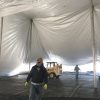 Setting up a 80' x 120' rope and pole tent at Kelly's Irish Pub for Saint Patrick's Day 2017 in Davenport, Iowa