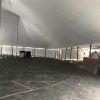 Under 80' x 120' rope and pole tent at Kelly's Irish Pub for Saint Patrick's Day 2017 in Davenport, Iowa