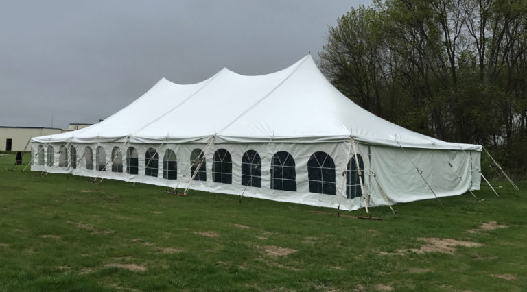 40' x 80' white rope and pole wedding tent.