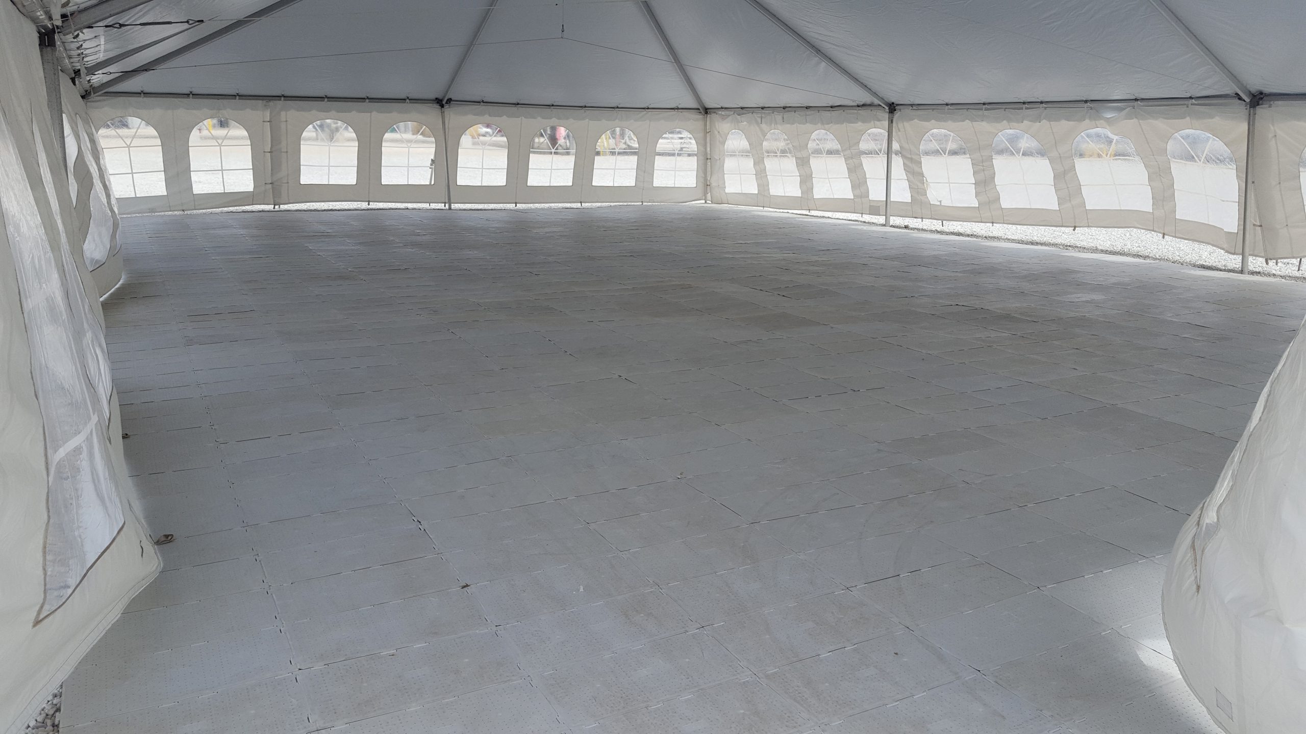 View under tent with 2,400 sq ft of sub floor