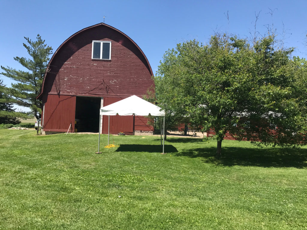 10' x 10' frame tents setup at an outdoor wedding in New Liberty Road, Walcott, IA