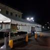 10' x 30' frame tent set up at night for an event