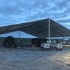 18m x 20m (60′ x 66’) Clearspan Tent at dusk
