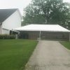 20' x 40' frame tent next to a home for Graduation Party