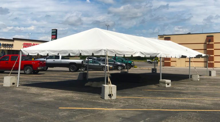 20' x 60' frame tent with blocks rented for a tent sale