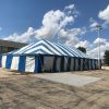 30' x 60' blue and white rope and pole tent for Fireworks Stand setup in Clinton, Iowa