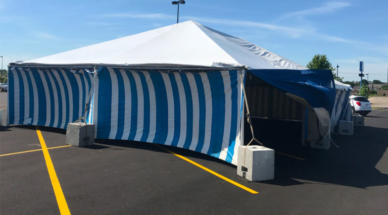 30' x 60' frame Fireworks stand tent at the Walmart Supercenter in Cedar Rapids, Iowa with blue and white side walls