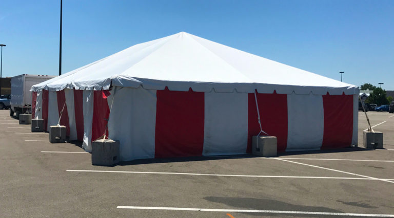 30' x 60' frame fireworks stand tent at the Walmart Supercenter in Cedar Rapids, Iowa with red and white side walls