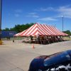 30' x 60' red and white rope and pole fireworks tent at Fareway Grocery at Westwinds Dr in Iowa City, Iowa