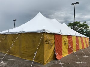 30' x 60' rope and pole tent at Hy-Vee 1823 E Kimberly Rd in Davenport, Iowa with Yellow and Orange side walls