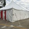40' x 60' rope and pole tent with Red and White Sidewall used for Fireworks tent at Hy-Vee in Cedar Rapids, Iowa