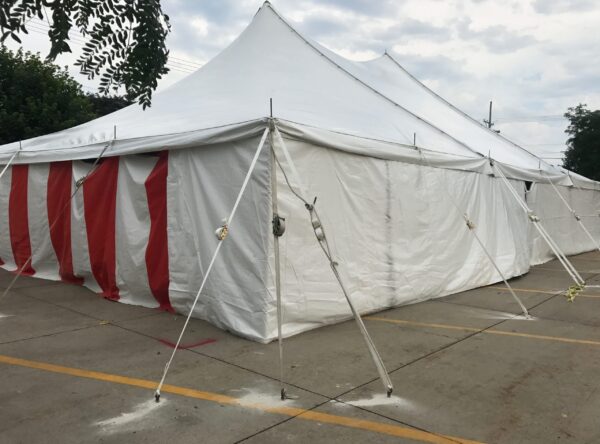 40' x 60' rope and pole tent with Red and White Sidewall used for Fireworks tent at Hy-Vee in Cedar Rapids, Iowa