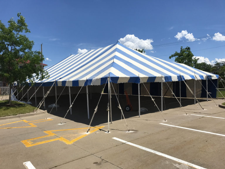 40' x 70' blue and white rope and pole tent for fireworks stand at Hy-Vee S. 1st Ave in Iowa City for Bellino Fireworks