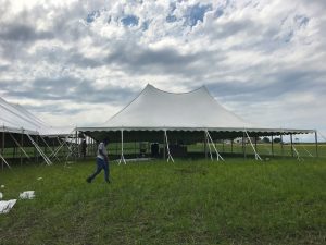 80' x 150' rope and pole on the far left with 10' x 10' frame tent in the middle with a 60' x 90' rope and pole tent on the right