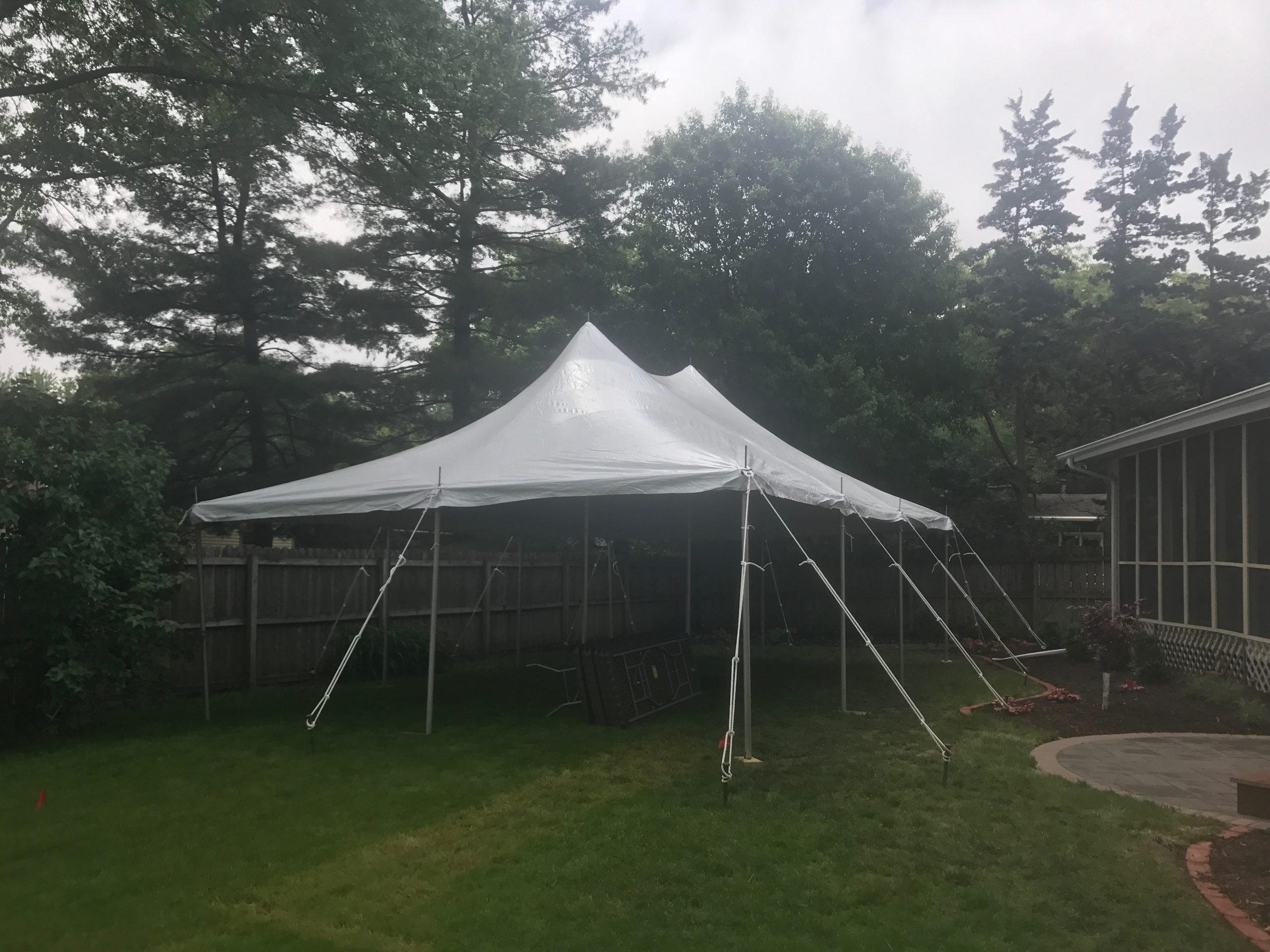 Backyard Graduation Party with 20' x 30' rope and pole tent in IC