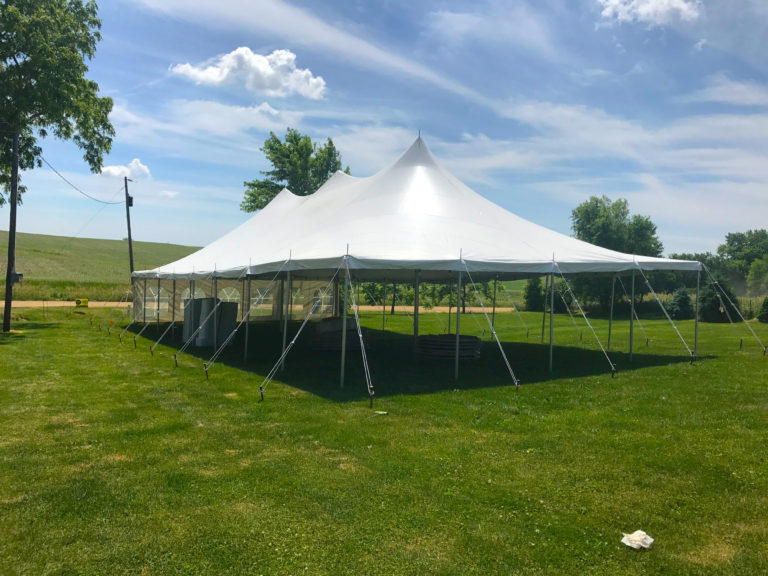 Corner of the 30' x 60' rope and pole wedding tent in De Witt, Iowa