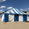End of the 30' x 60' blue and white rope and pole tent for Fireworks Stand setup in Clinton, Iowa