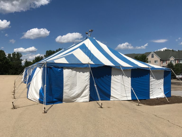 End of the 30' x 60' blue and white rope and pole tent for Fireworks Stand setup in Clinton, Iowa