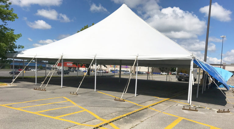 Large 60' x 60' rope and pole tent for fireworks stand in Marion, IA
